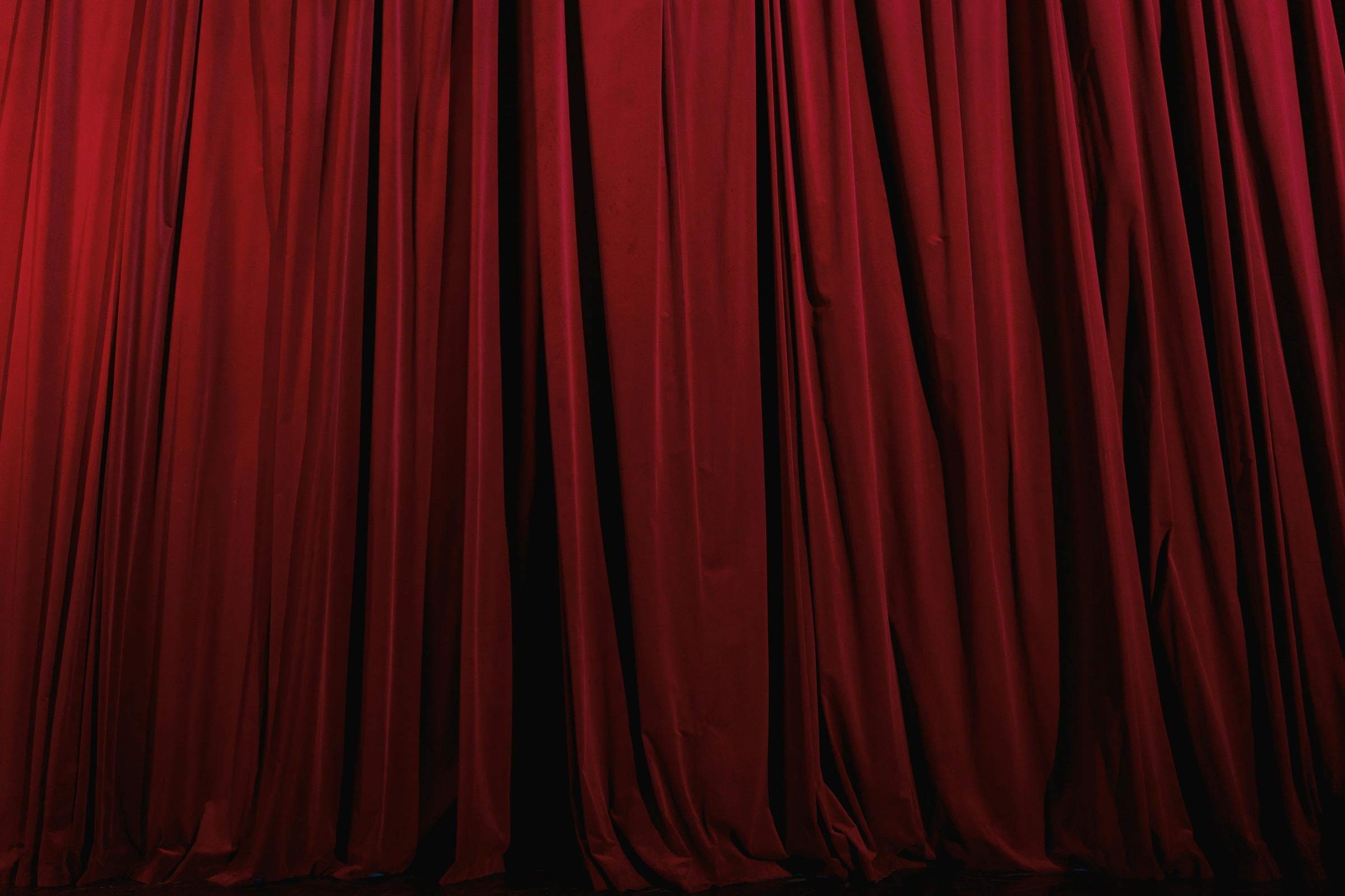 Deep red theatrical curtains